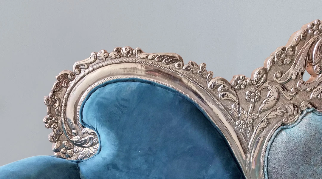 White metal clad sofa set